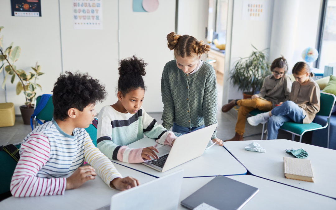Students practicing important digital skills in middle school technology lab