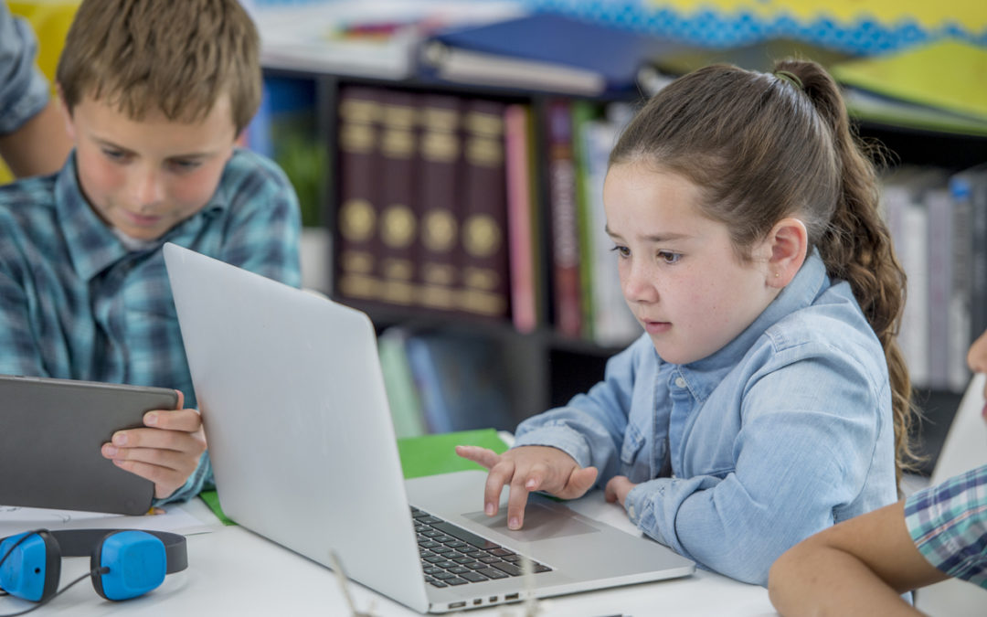 Young female student studying computer fundamentals and computer coding